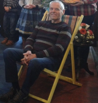 Member fo congregation sitting in deck chair